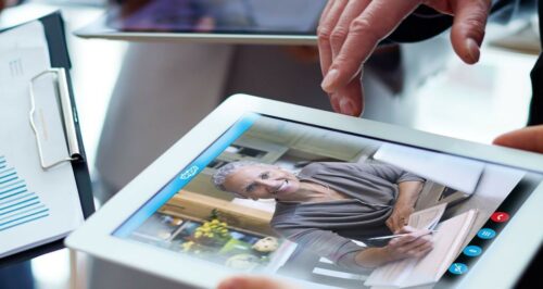 Person holding tablet